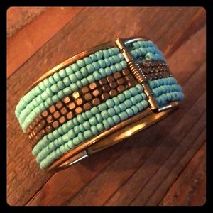 seed-bead turquoise+gold tone bracelet.